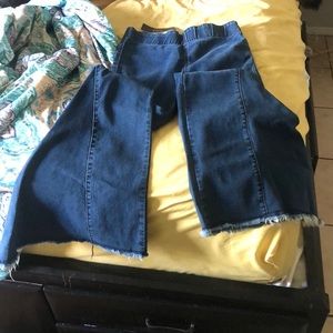 Elastic waist band, bell bottom flare.